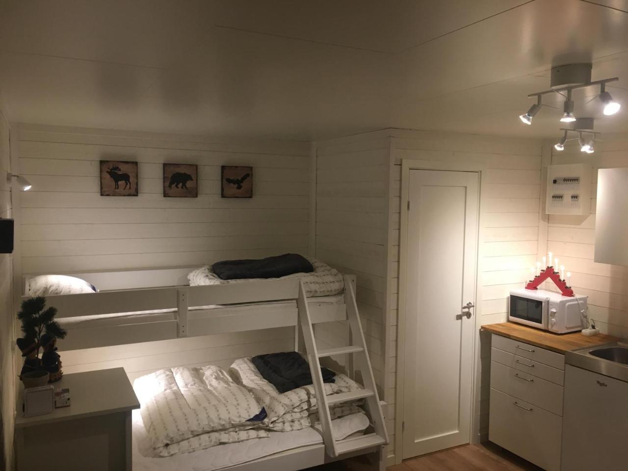 Camp Caroli Wooden Cabins Jukkasjärvi المظهر الخارجي الصورة